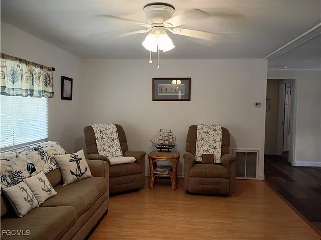 a living room with furniture and a couch