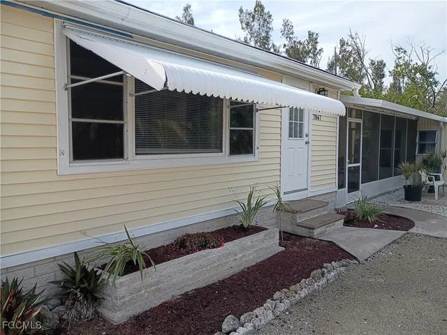 a view of a house with a patio