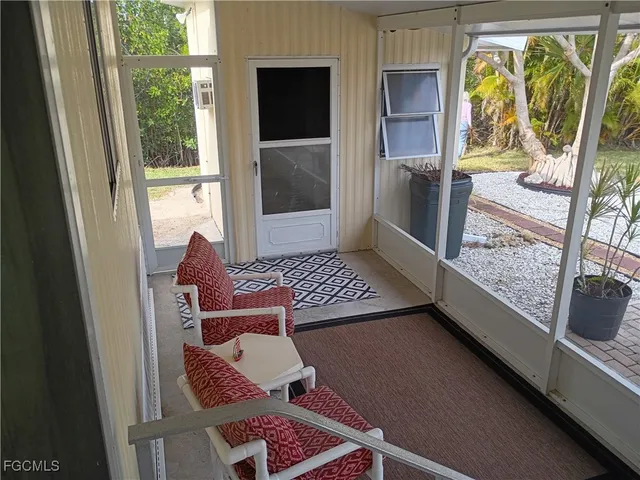 a view of outdoor sitting area with furniture