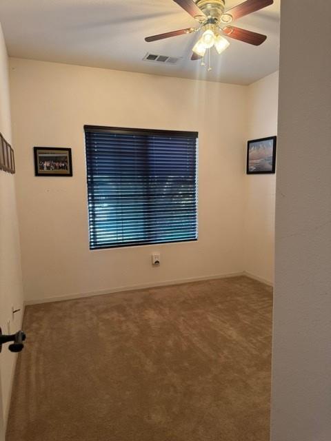 30639 Kit Fox Court Visalia, CA 93291 - Photo 11 of 16 a view of an empty room with a window