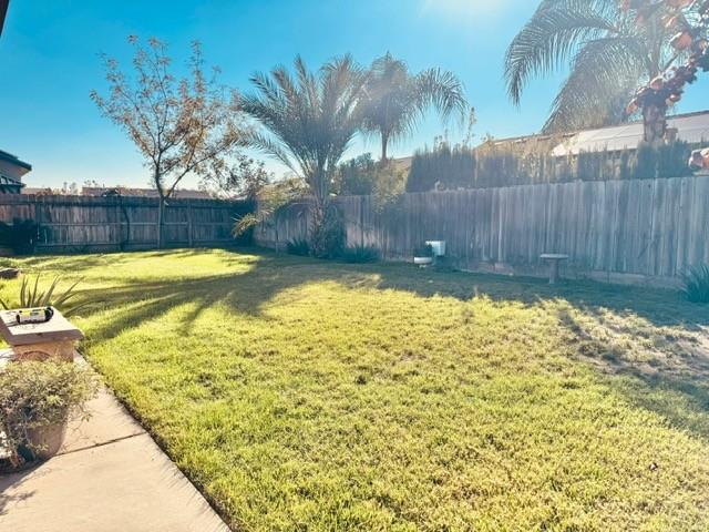 30639 Kit Fox Court Visalia, CA 93291 - Photo 14 of 16 a view of a swimming pool with a patio