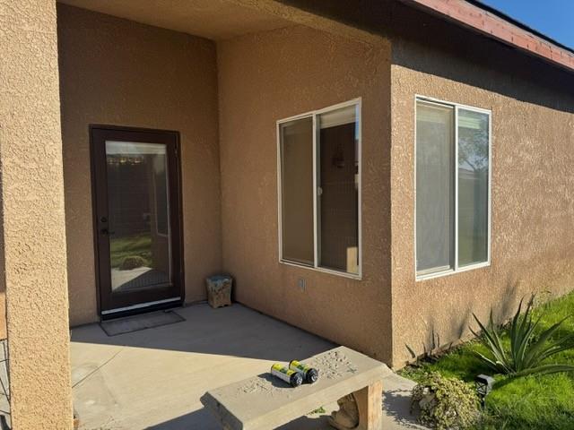 30639 Kit Fox Court Visalia, CA 93291 - Photo 15 of 16 a front view of a house with a yard