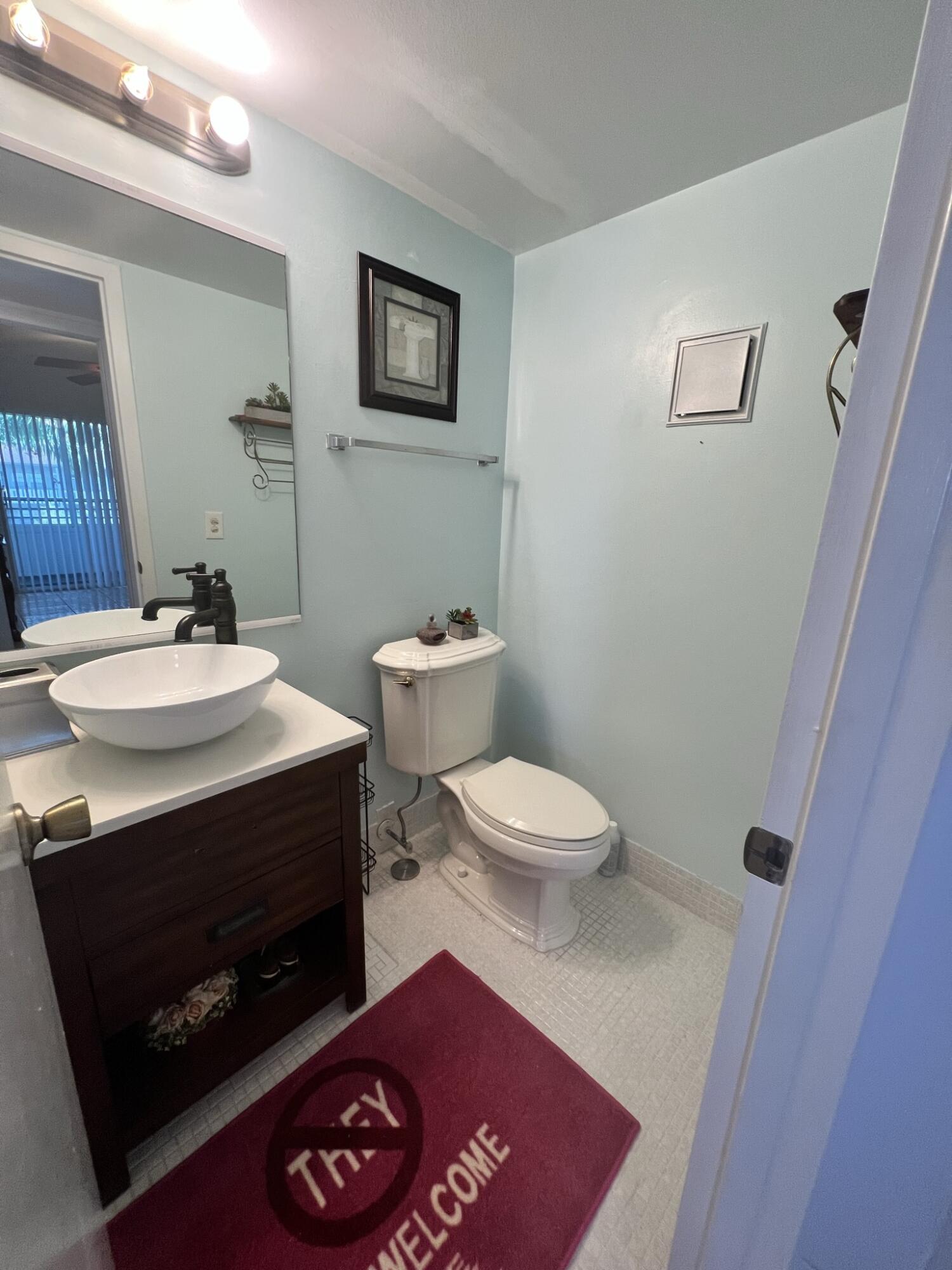 200 Suffolk F, Unit E Boca Raton, FL 33434 - Photo 15 of 27 Half Bath 1 - Copy - Copy - Copy - Copy