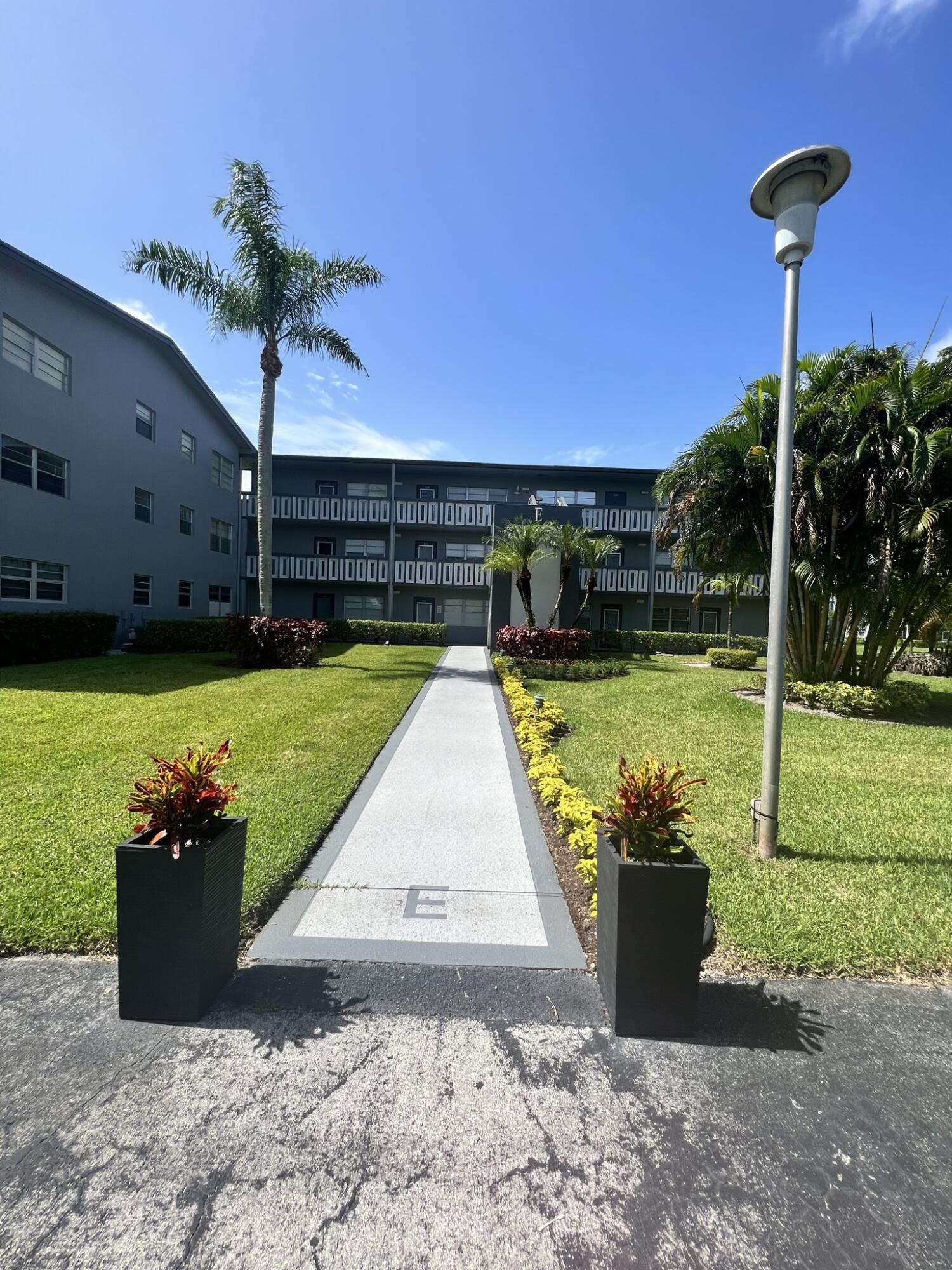 200 Suffolk F, Unit E Boca Raton, FL 33434 - Photo 17 of 27 Building Entrance - Copy - Copy - Copy -