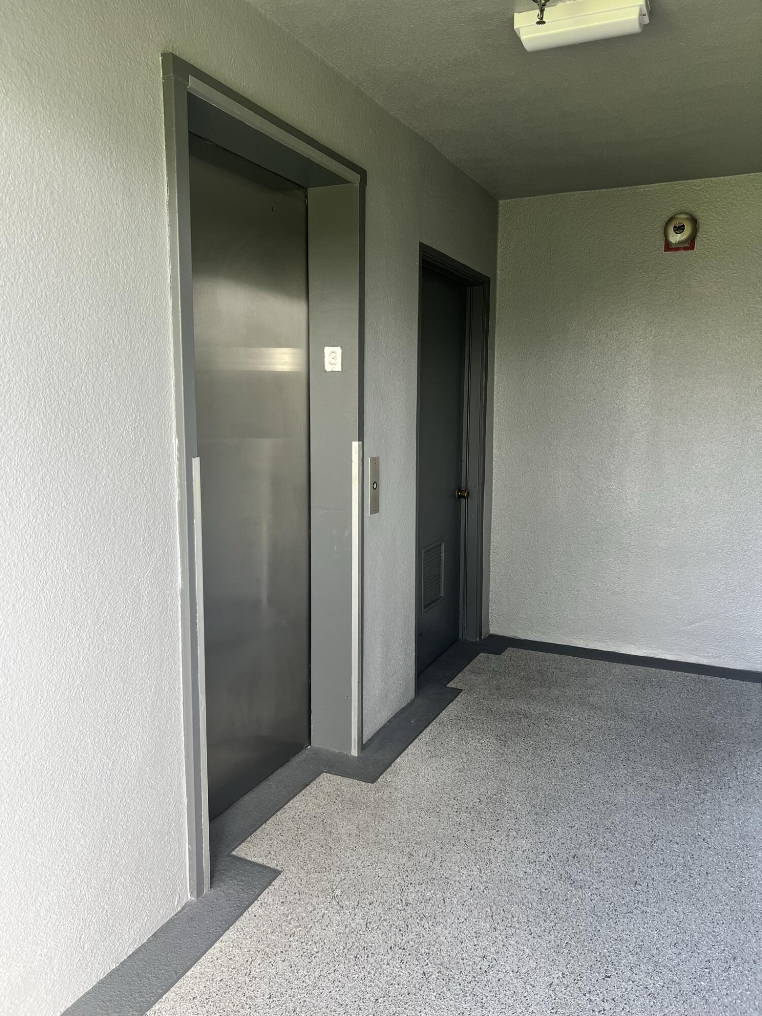 200 Suffolk F, Unit E Boca Raton, FL 33434 - Photo 18 of 27 Elevator - Copy - Copy - Copy - Copy - C