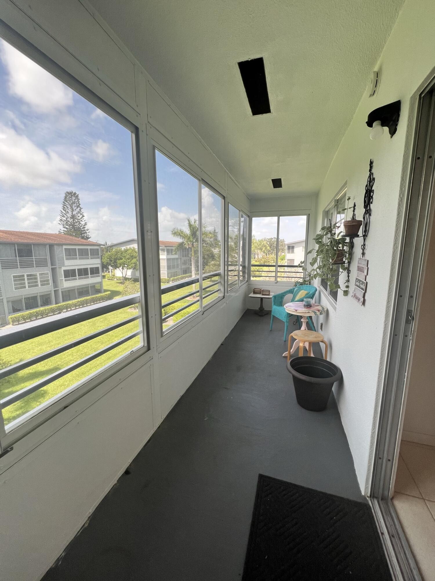 200 Suffolk F, Unit E Boca Raton, FL 33434 - Photo 19 of 27 Enclosed Patio - Copy - Copy - Copy - Co