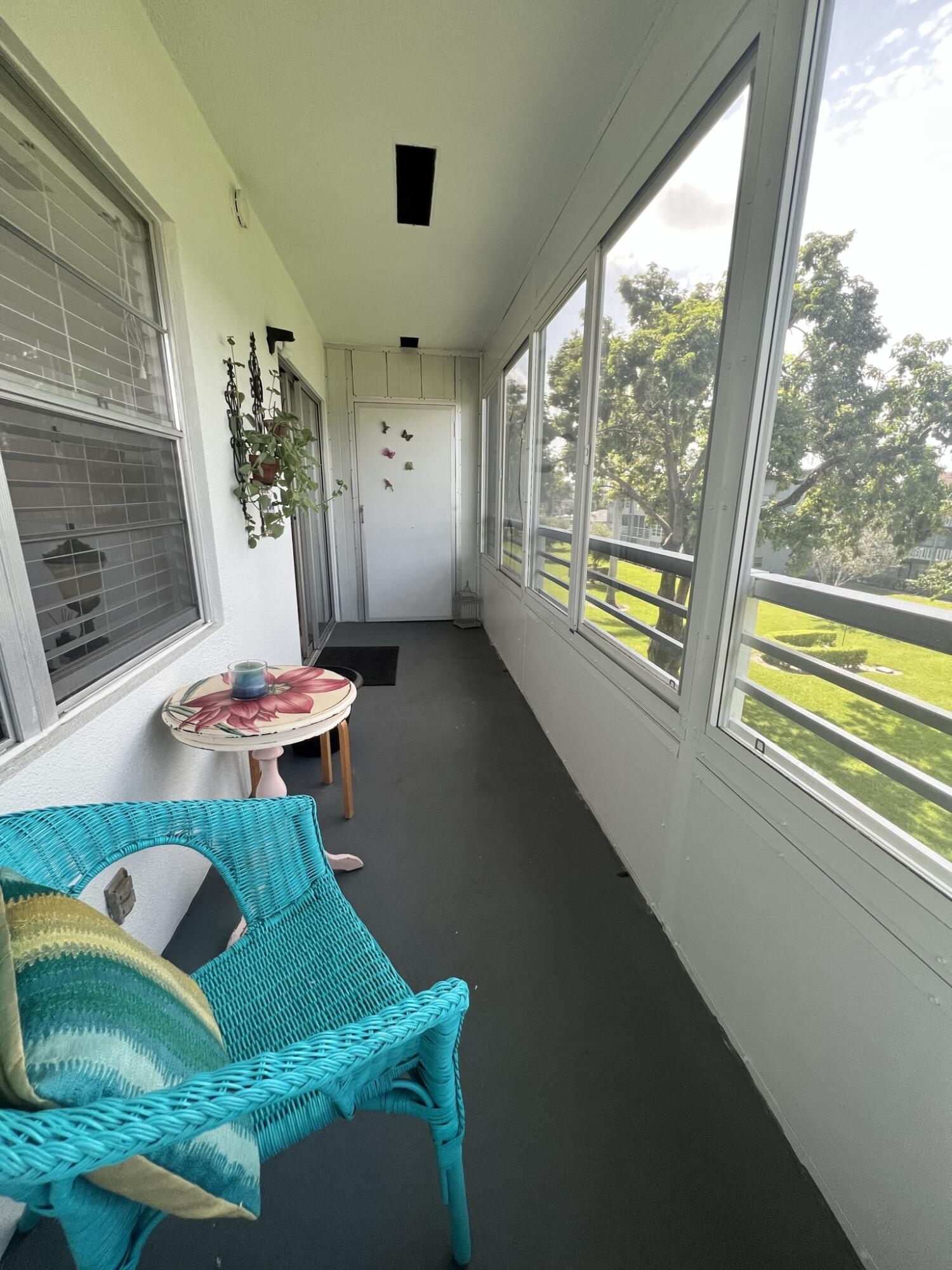 200 Suffolk F, Unit E Boca Raton, FL 33434 - Photo 20 of 27 Enclosed Patio 2 - Copy - Copy - Copy -