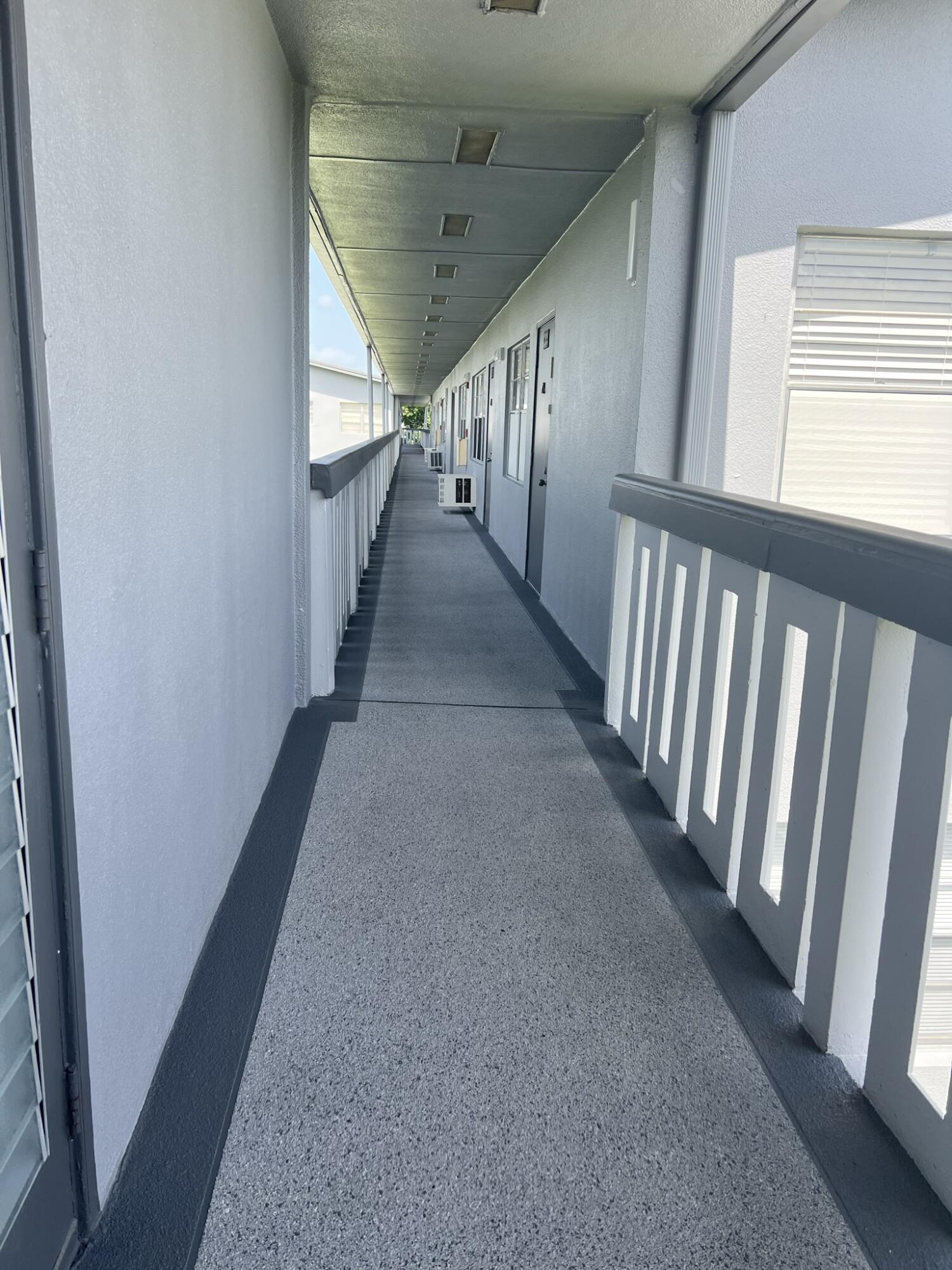 200 Suffolk F, Unit E Boca Raton, FL 33434 - Photo 24 of 27 Outside of Front Door Walkway - Copy - C