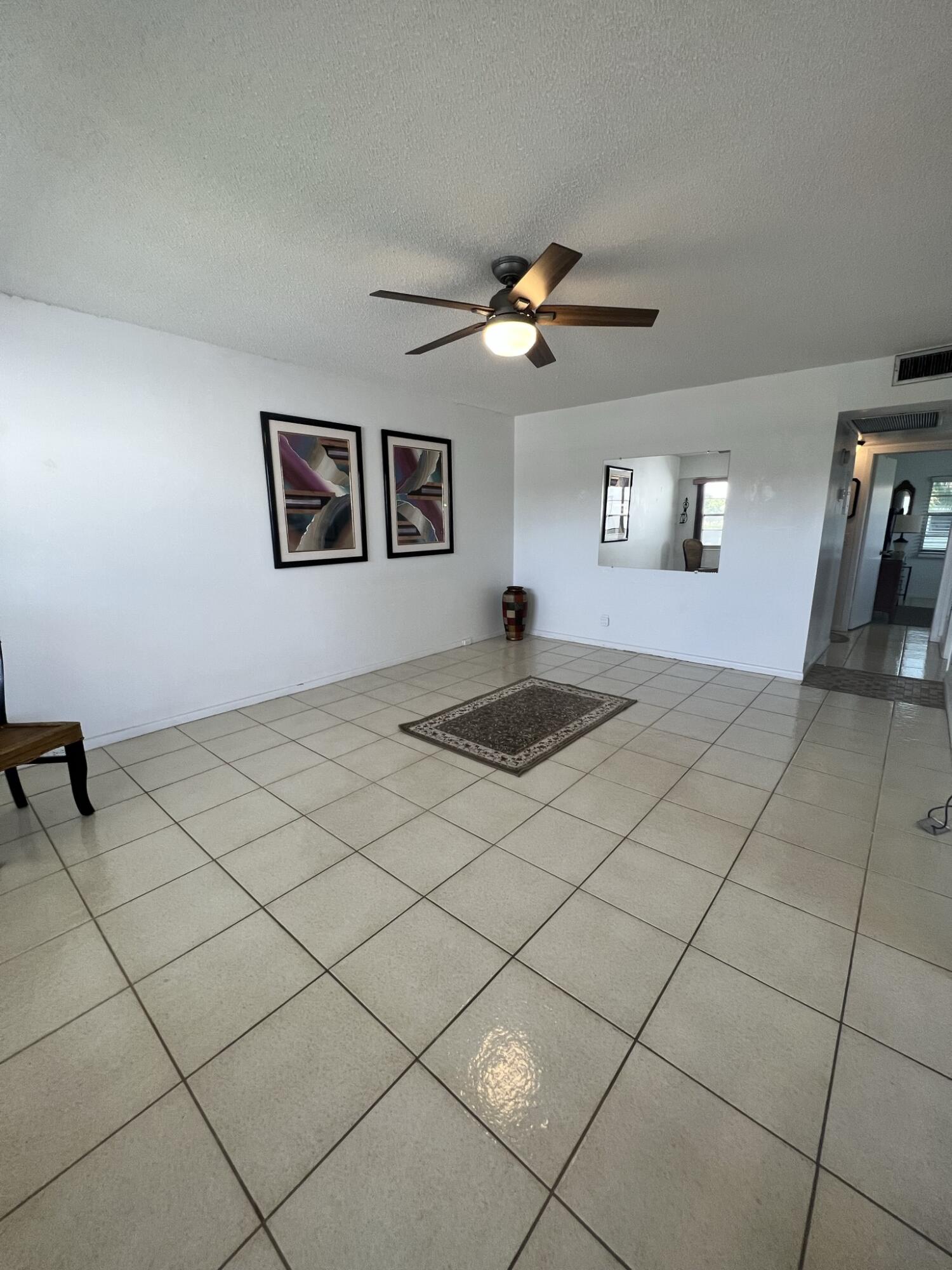 200 Suffolk F, Unit E Boca Raton, FL 33434 - Photo 5 of 27 Living Room - Copy - Copy - Copy