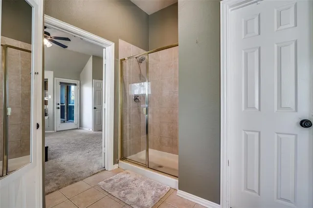 a view of a bathroom from a hallway