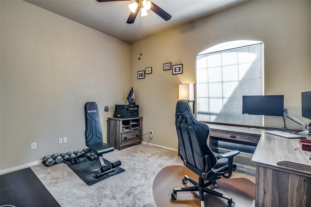 4317 Founders Drive Rowlett, TX 75089 - Photo 18 of 25 a view of a workspace with furniture and a window