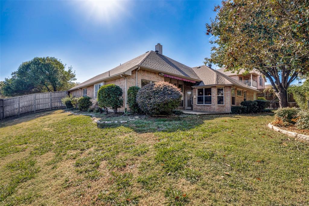 4317 Founders Drive Rowlett, TX 75089 - Photo 25 of 25 a front view of a house with a yard