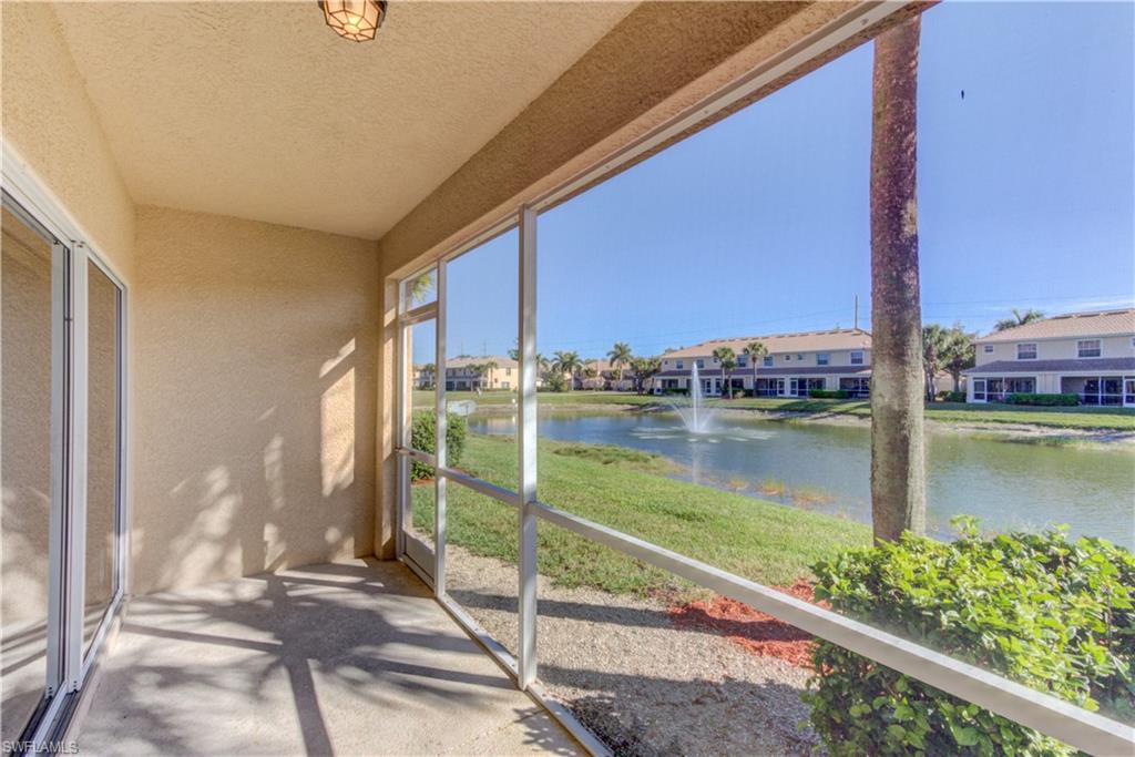 11719 Eros Road Lehigh Acres, FL 33971 - Photo 6 of 20 a view of a balcony with lake view