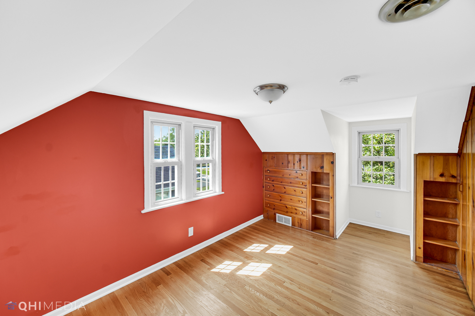18345 Perth Avenue Homewood, IL 60430 - Photo 14 of 22 an empty room with wooden floor and windows