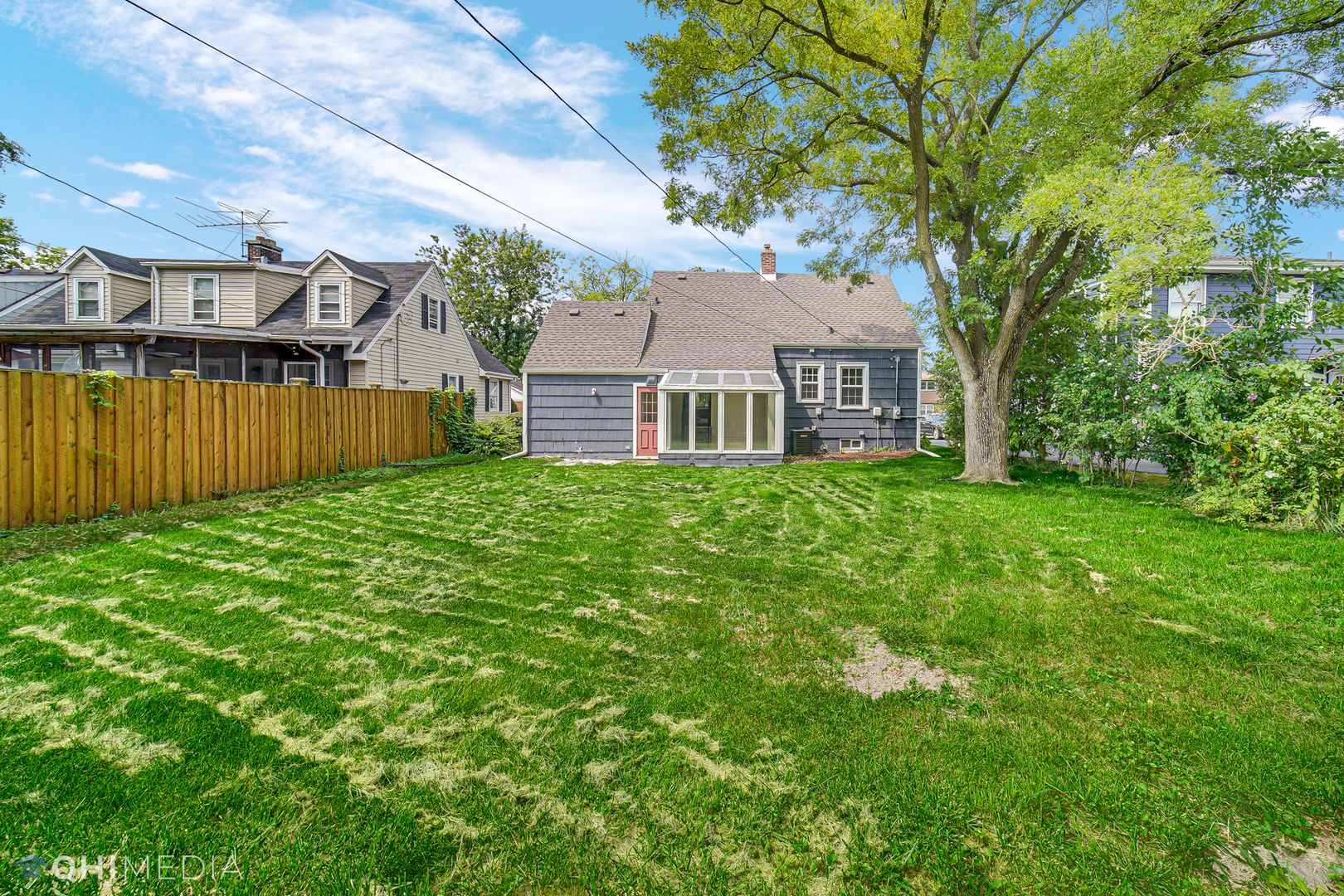 18345 Perth Avenue Homewood, IL 60430 - Photo 21 of 22 a front view of a house with yard and green space
