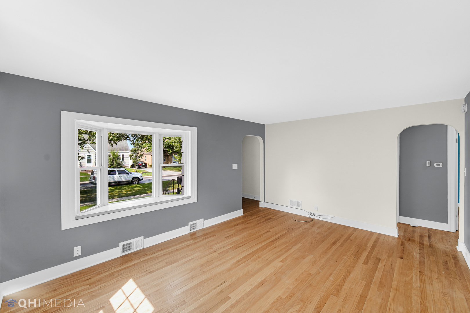 18345 Perth Avenue Homewood, IL 60430 - Photo 5 of 22 a view of empty room with wooden floor and fan