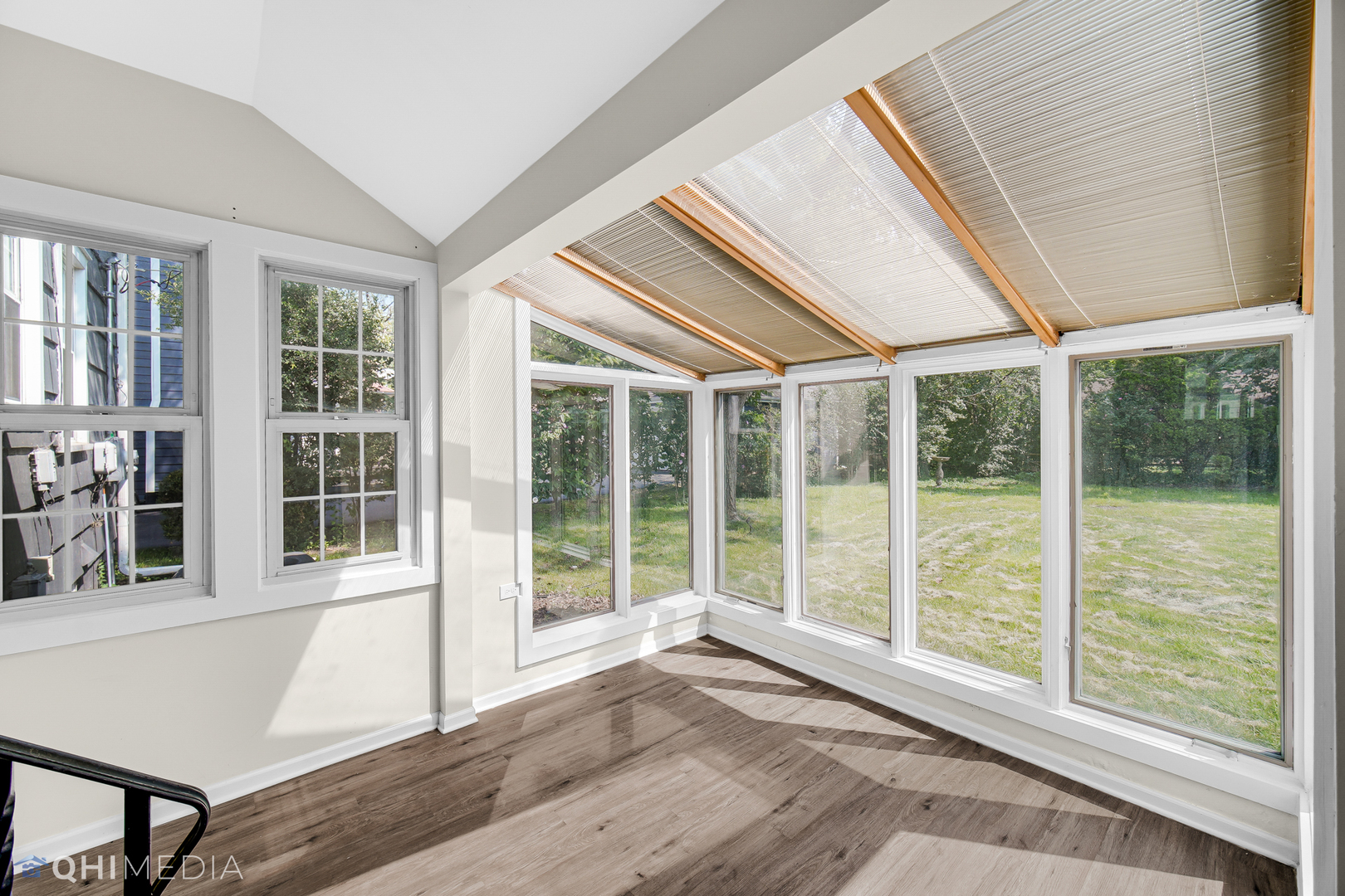 18345 Perth Avenue Homewood, IL 60430 - Photo 9 of 22 a view of an empty room with wooden floor and a window