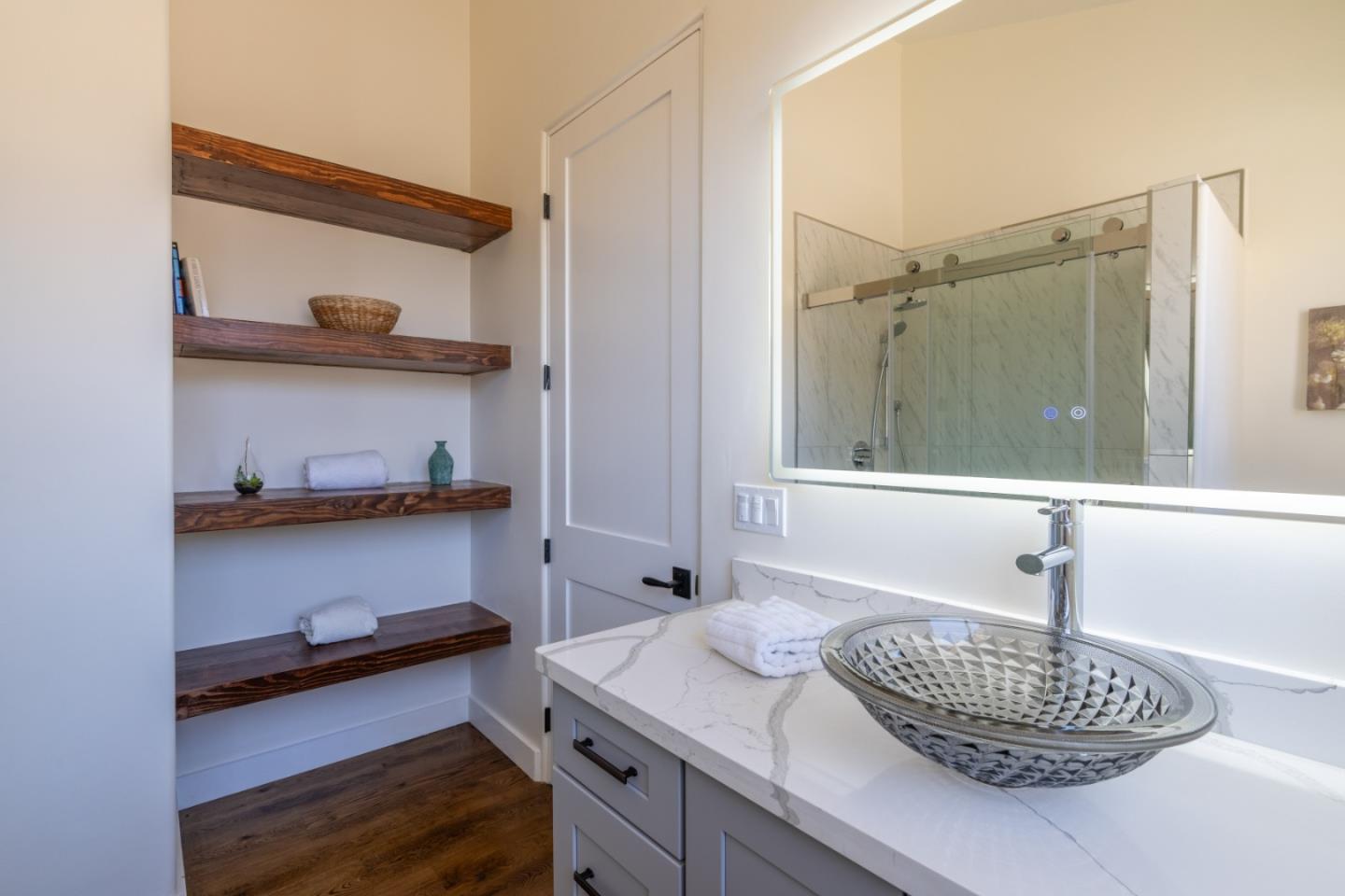 9020 Hidden Canyon Road Salinas, CA 93907 - Photo 31 of 58 a bathroom with a sink a vanity and a window