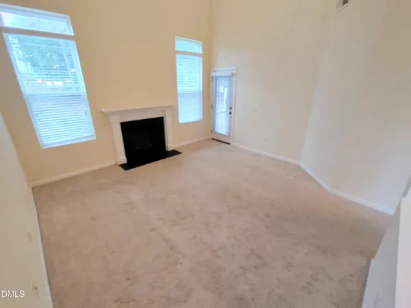 a view of empty room with front door