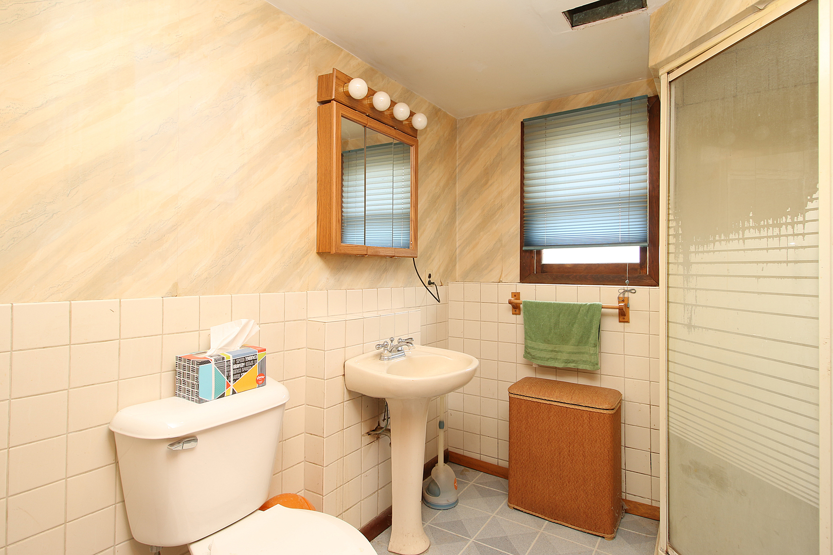 1356 Smith Road Lockport, IL 60441 - Photo 14 of 20 a bathroom with a toilet sink and mirror