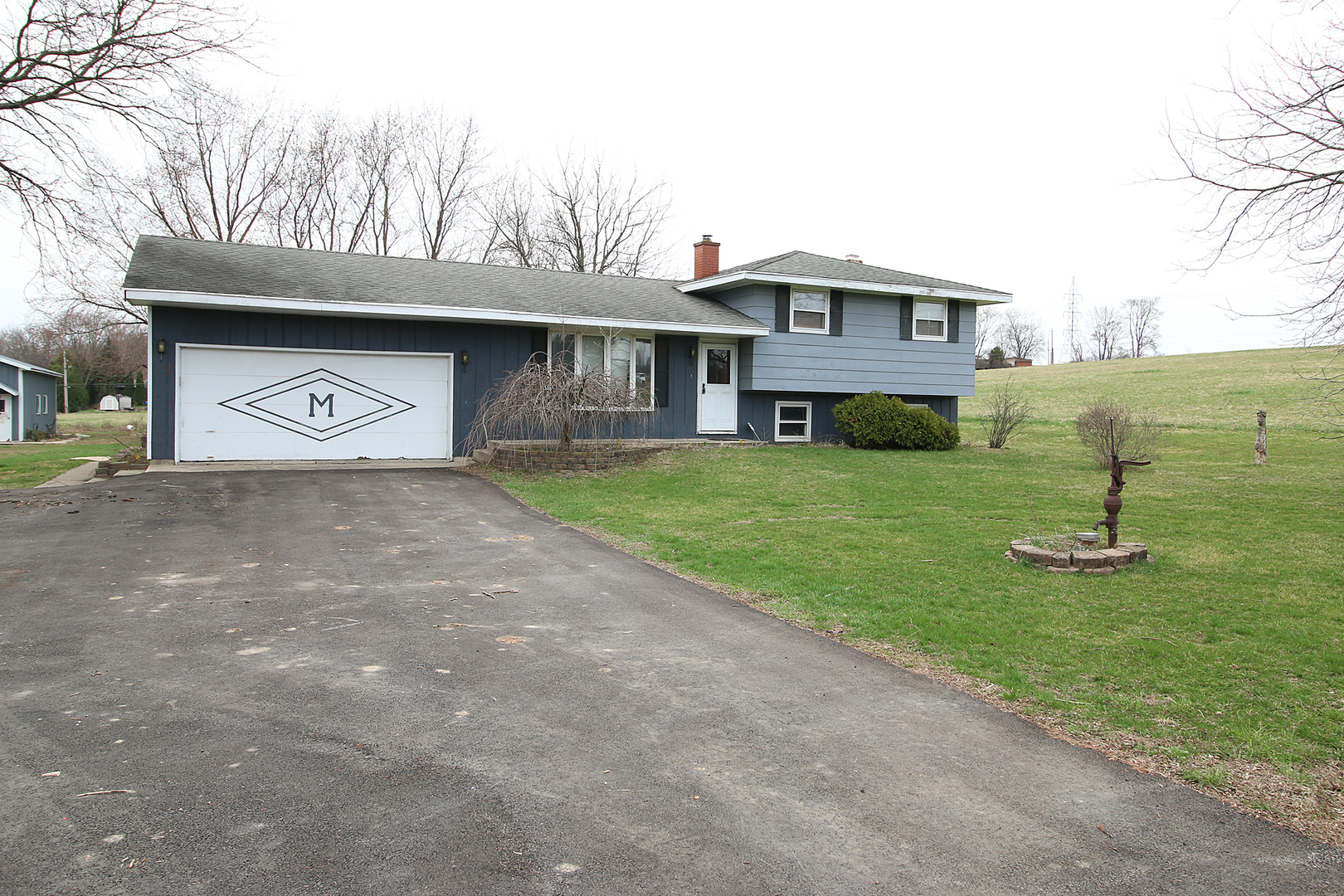 1356 Smith Road Lockport, IL 60441 - Photo 20 of 20 a front view of a house with garden