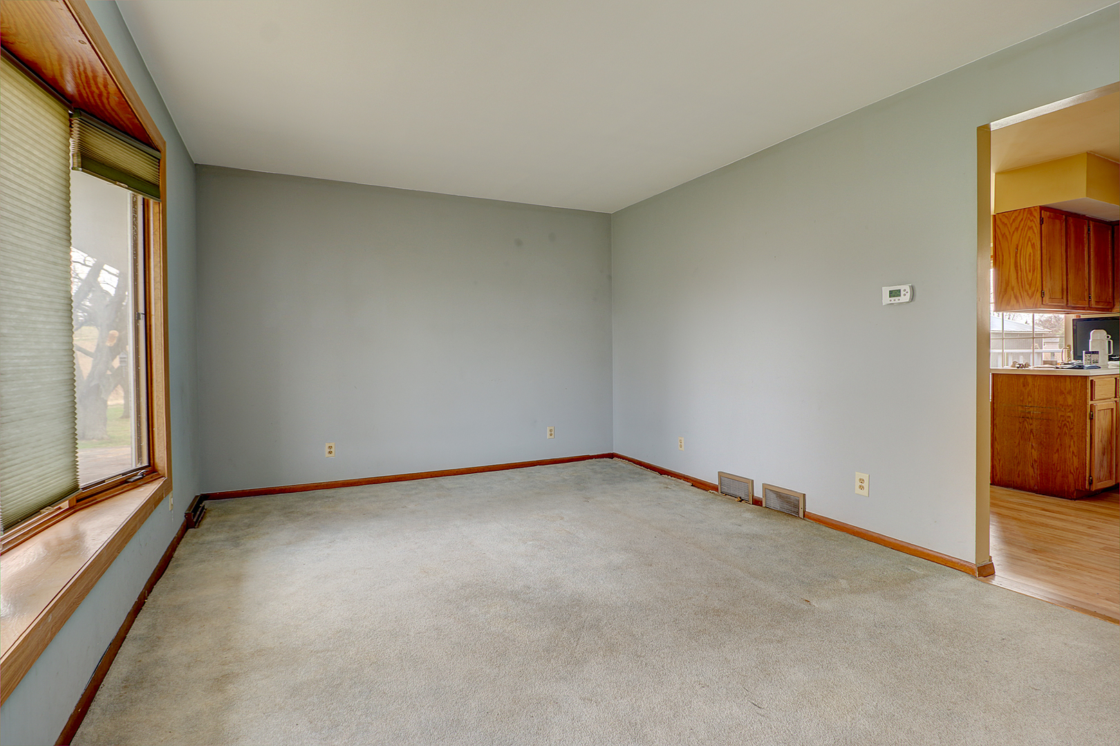 1356 Smith Road Lockport, IL 60441 - Photo 5 of 20 a view of an empty room with a window