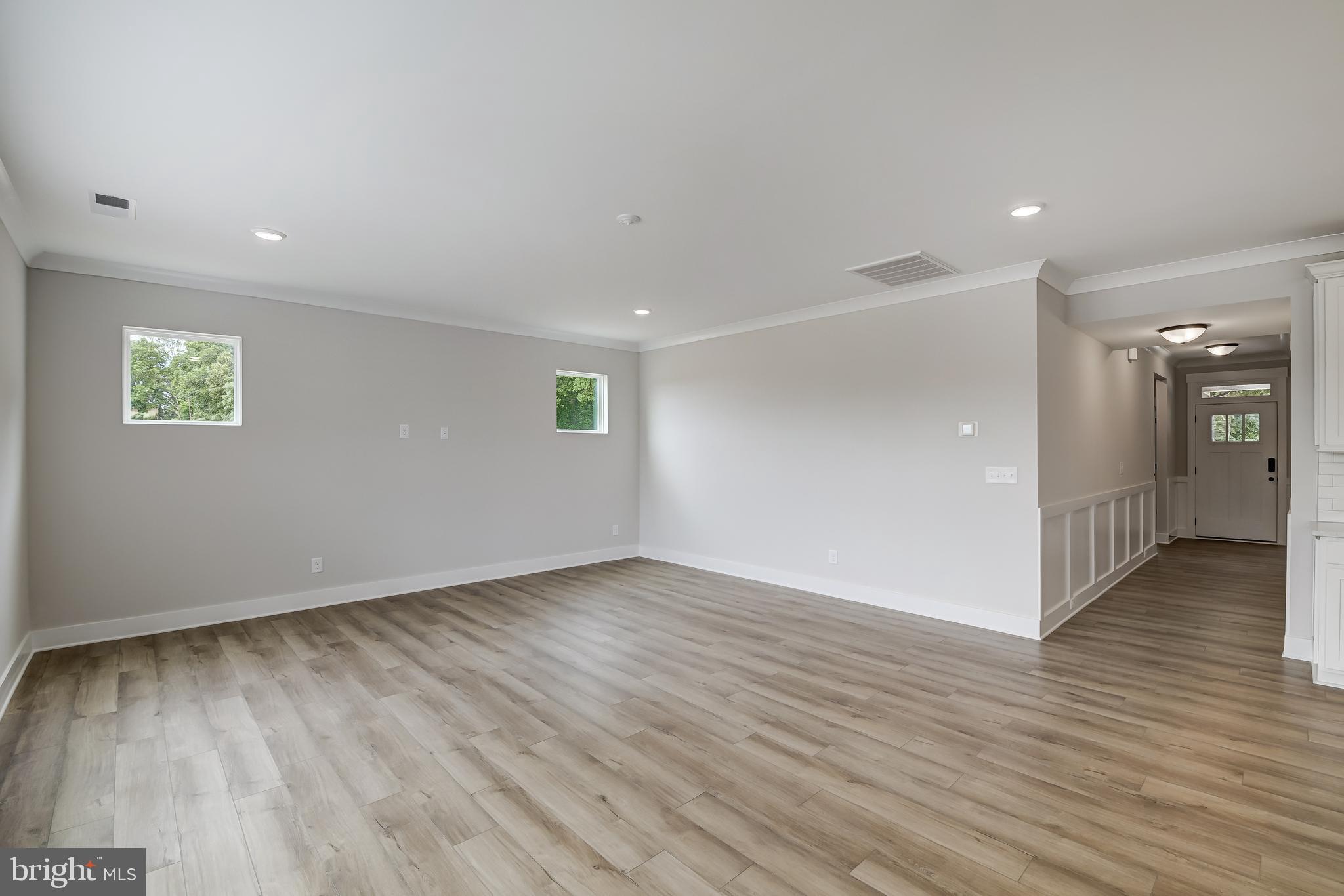 3186 Three Chopt Road Gum Spring, VA 23065 - Photo 7 of 11 a view of an empty room with wooden floor