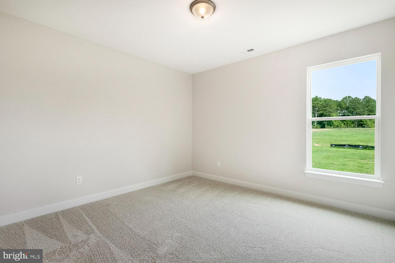 3186 Three Chopt Road Gum Spring, VA 23065 - Photo 8 of 11 a view of a room that has a window in it