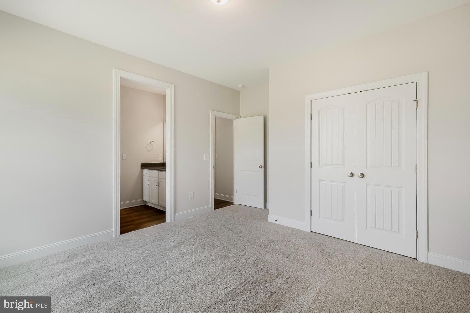 3186 Three Chopt Road Gum Spring, VA 23065 - Photo 9 of 11 a view of a room with a hallway