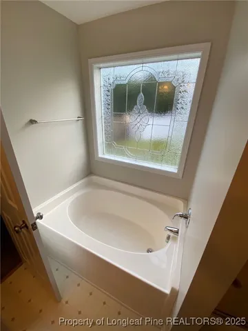a bathroom with a tub