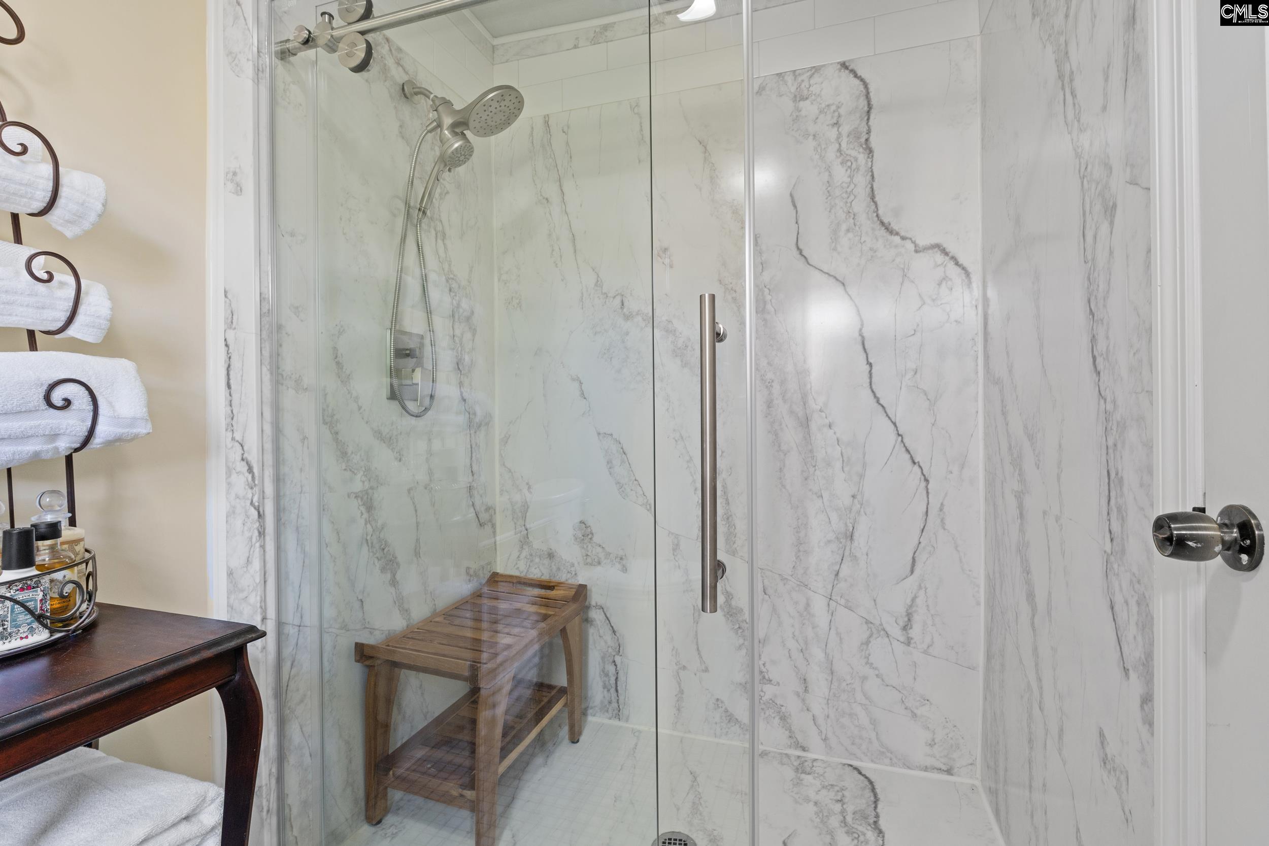 115 Rocky Ridge Road Leesville, SC 29070 - Photo 23 of 51 a bathroom with a shower