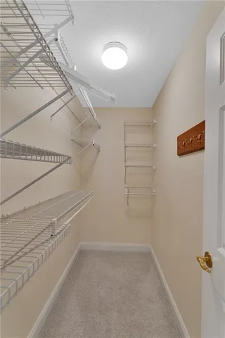 a view of a room with racks on the wall