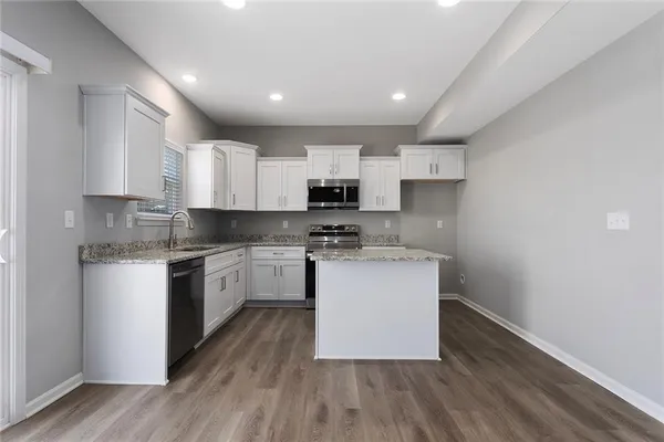 $379,900 | 702 Red Clover Court, Raymore, MO 64083