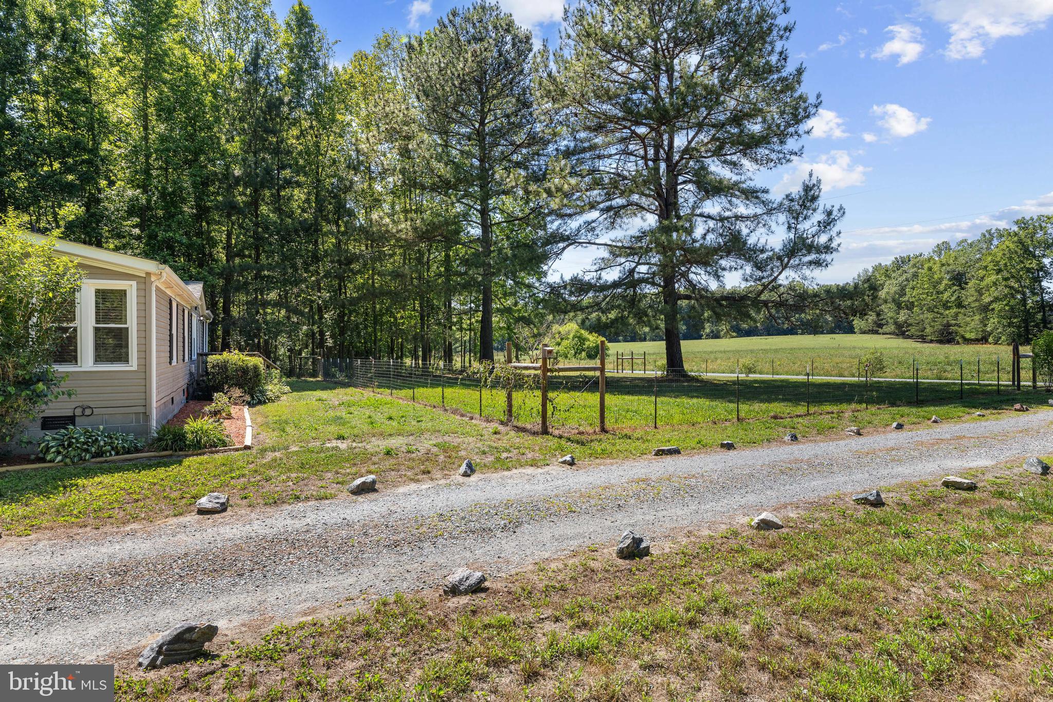 4278 Dorrell Road Aylett, VA 23009 - Photo 28 of 34 private driveway and fenced front yard