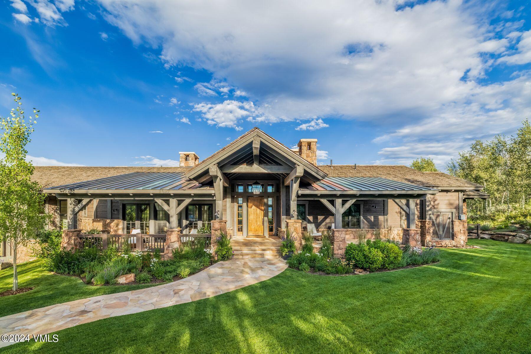 76 Setting Sun Lane Wolcott, CO 81655 - Photo 13 of 79 a front view of a house with a yard