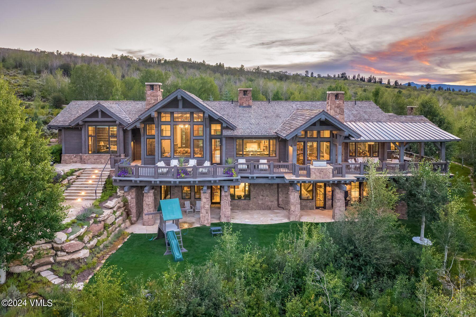 76 Setting Sun Lane Wolcott, CO 81655 - Photo 2 of 79 an aerial view of a house with swimming pool patio and lake view