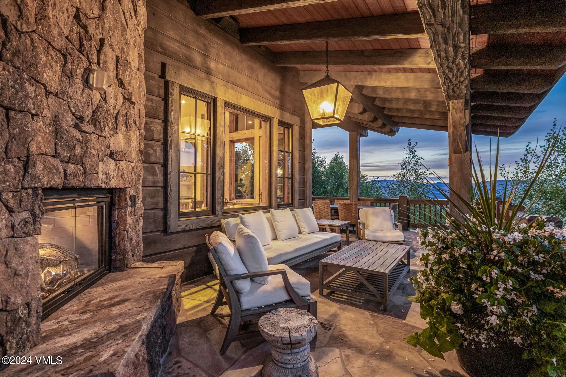 76 Setting Sun Lane Wolcott, CO 81655 - Photo 24 of 79 a building outdoor space with patio furniture and potted plants