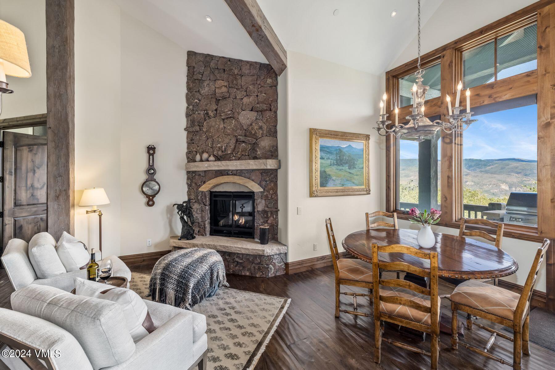76 Setting Sun Lane Wolcott, CO 81655 - Photo 34 of 79 a living room with furniture and a fireplace