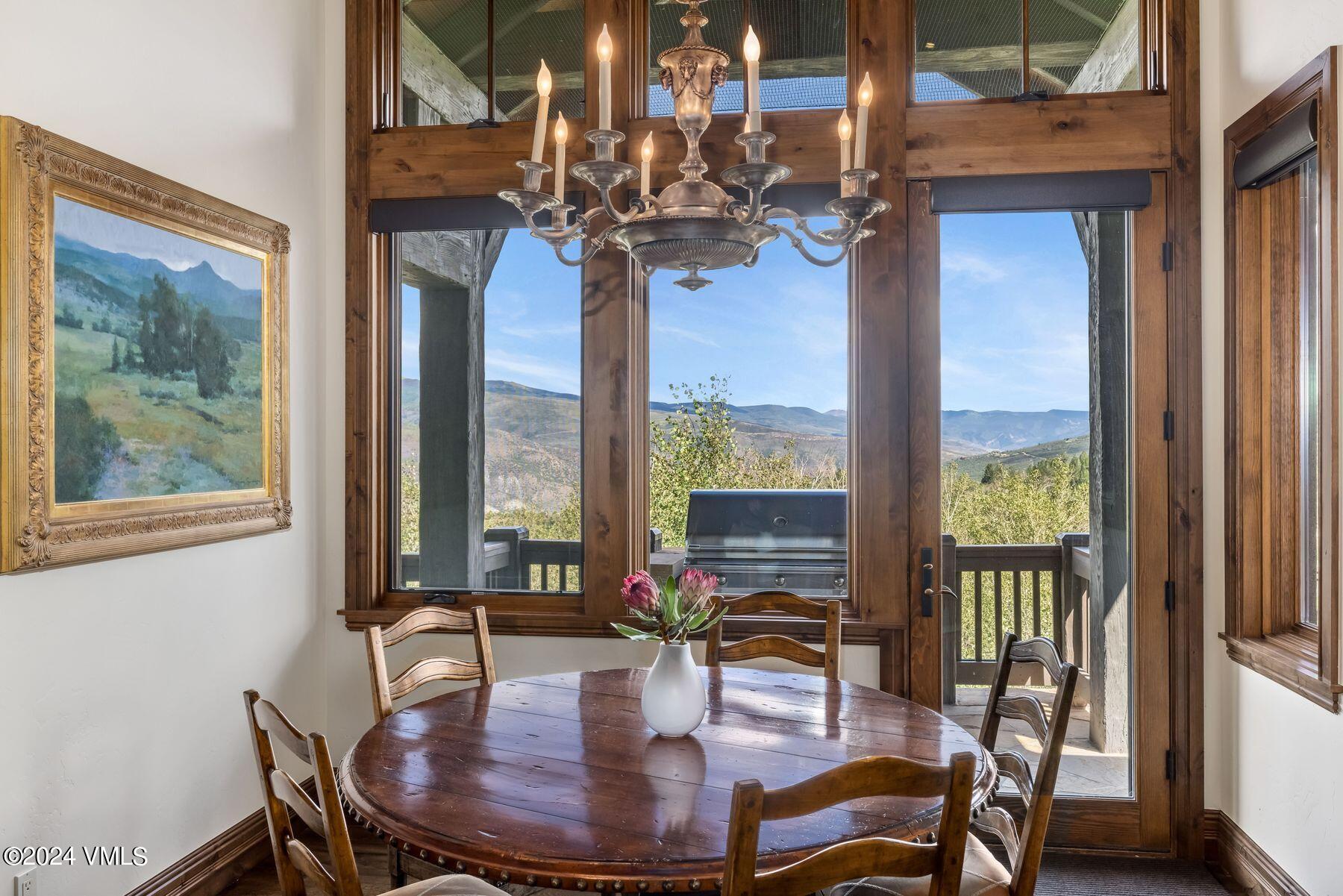 76 Setting Sun Lane Wolcott, CO 81655 - Photo 35 of 79 a view of a dining room with furniture window and outside view