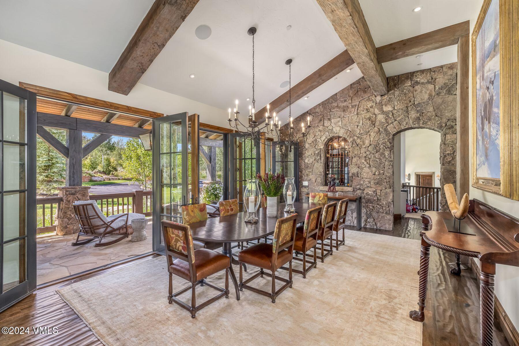 76 Setting Sun Lane Wolcott, CO 81655 - Photo 37 of 79 a view of a dining room with furniture window and outside view