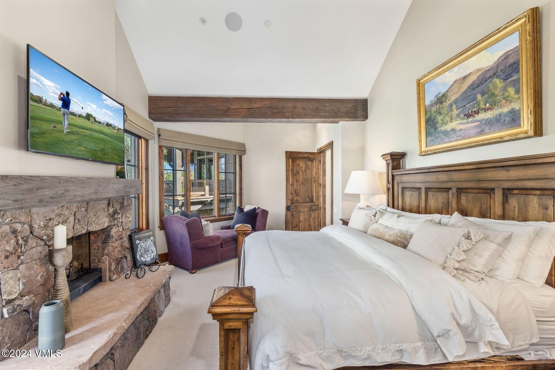 76 Setting Sun Lane Wolcott, CO 81655 - Photo 48 of 79 a bedroom with a bed and a couch