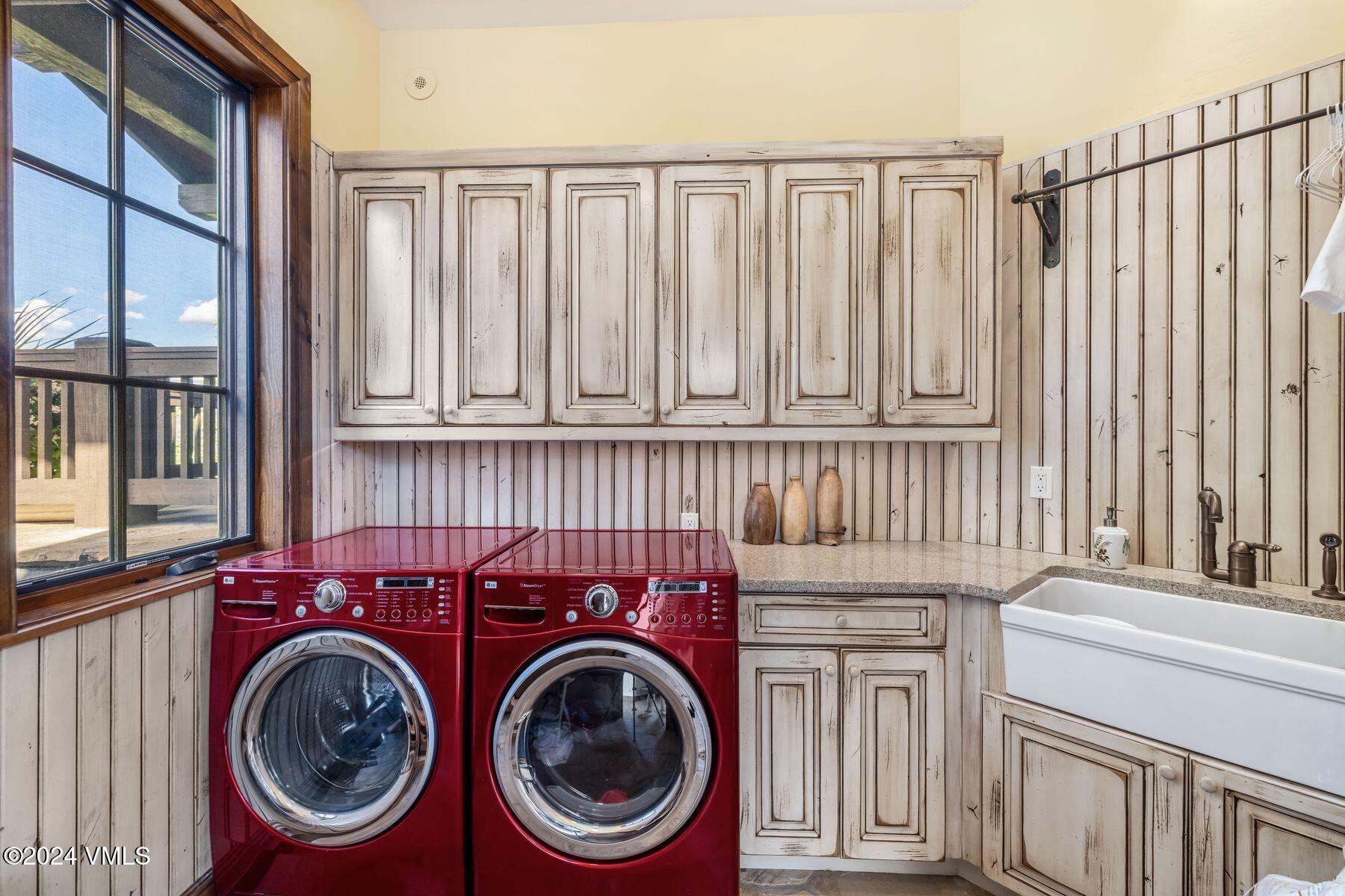 76 Setting Sun Lane Wolcott, CO 81655 - Photo 51 of 79 a utility room with dryer and washer