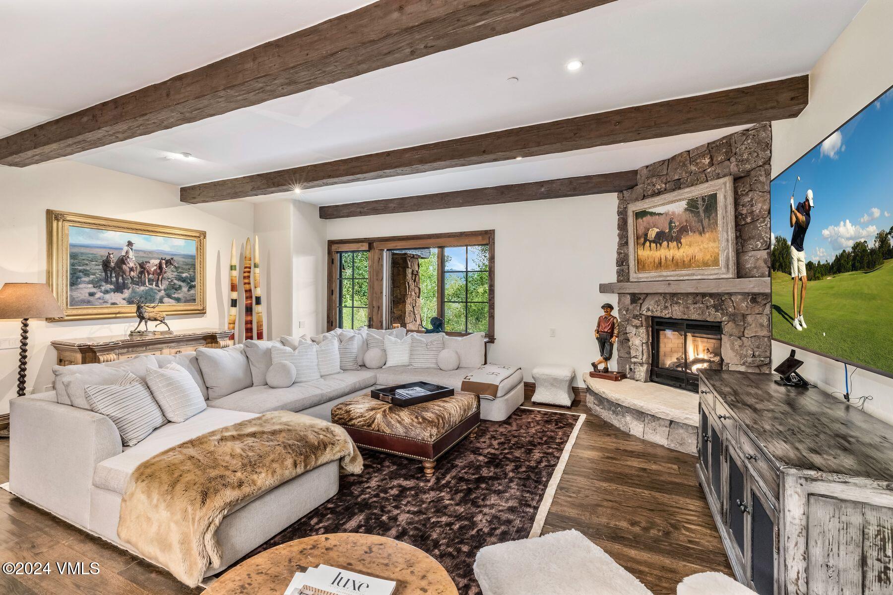 76 Setting Sun Lane Wolcott, CO 81655 - Photo 53 of 79 a living room with furniture fireplace and a large window