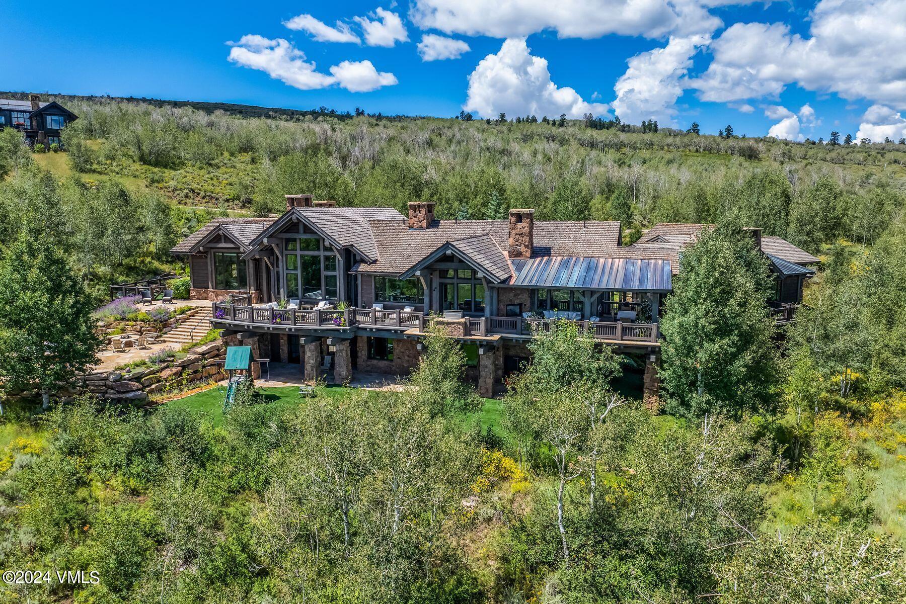 76 Setting Sun Lane Wolcott, CO 81655 - Photo 70 of 79 a view of a house with pool and chairs