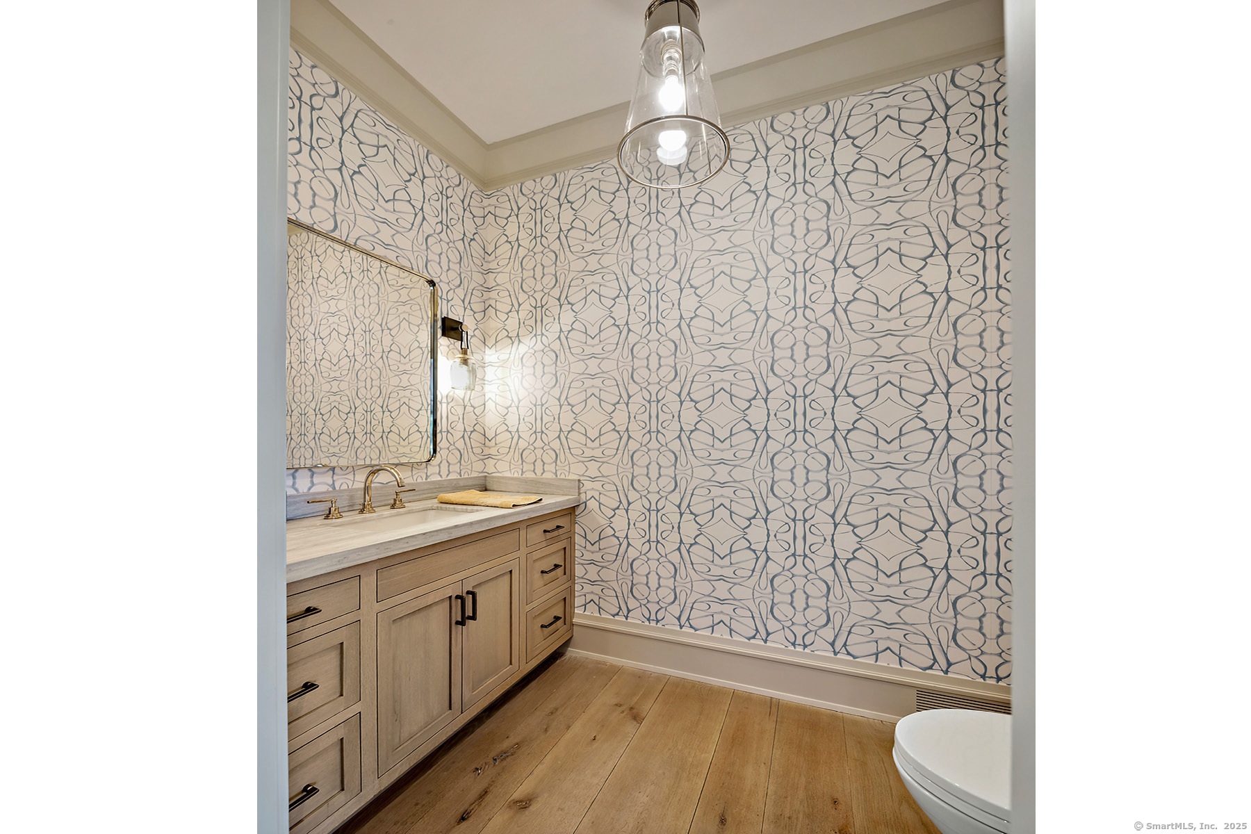 39 Compo Parkway Westport, CT 06880 - Photo 14 of 40 a spacious bathroom with a granite countertop sink a toilet and a mirror