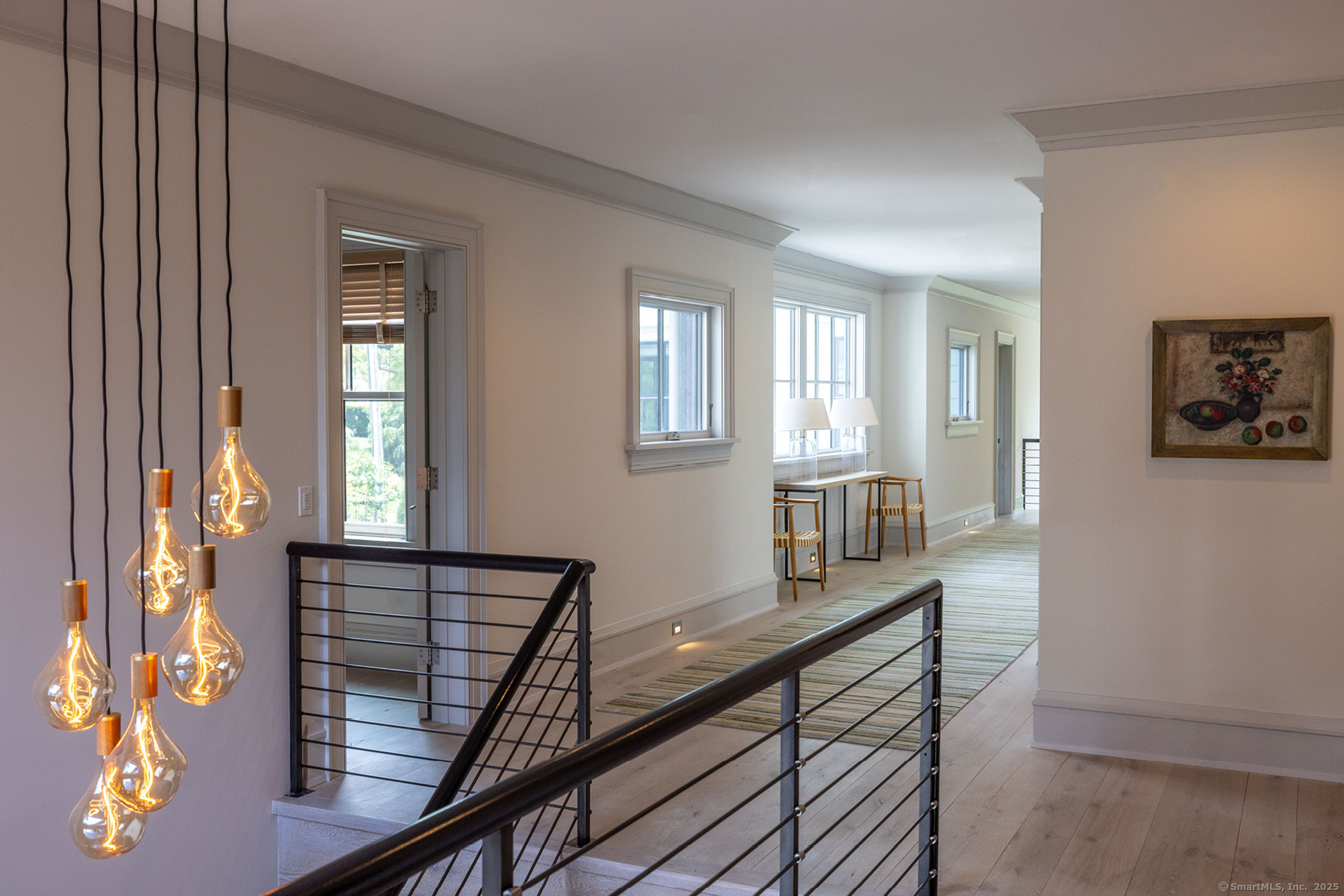 39 Compo Parkway Westport, CT 06880 - Photo 17 of 40 a view of an entryway with wooden floor and windows
