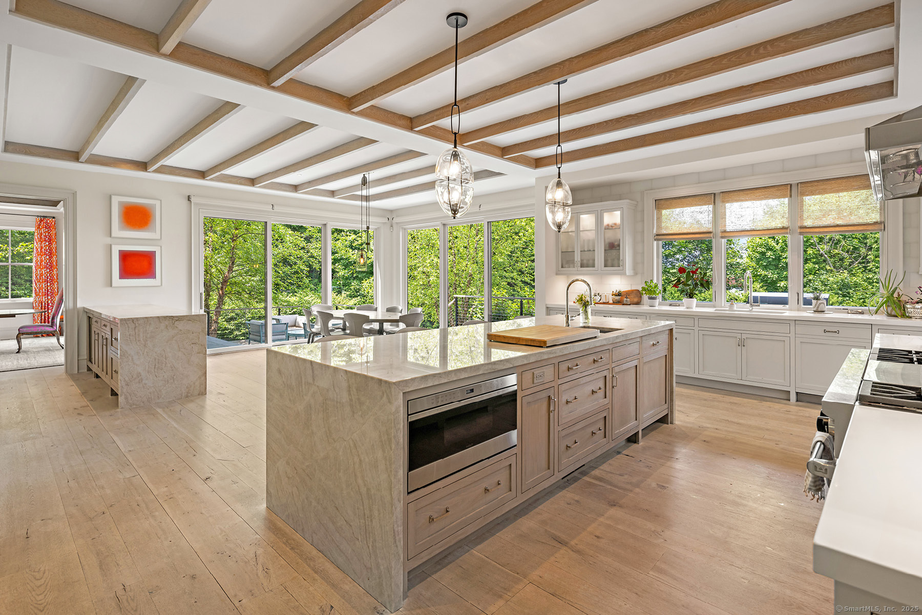 39 Compo Parkway Westport, CT 06880 - Photo 9 of 40 a large white kitchen with a large window