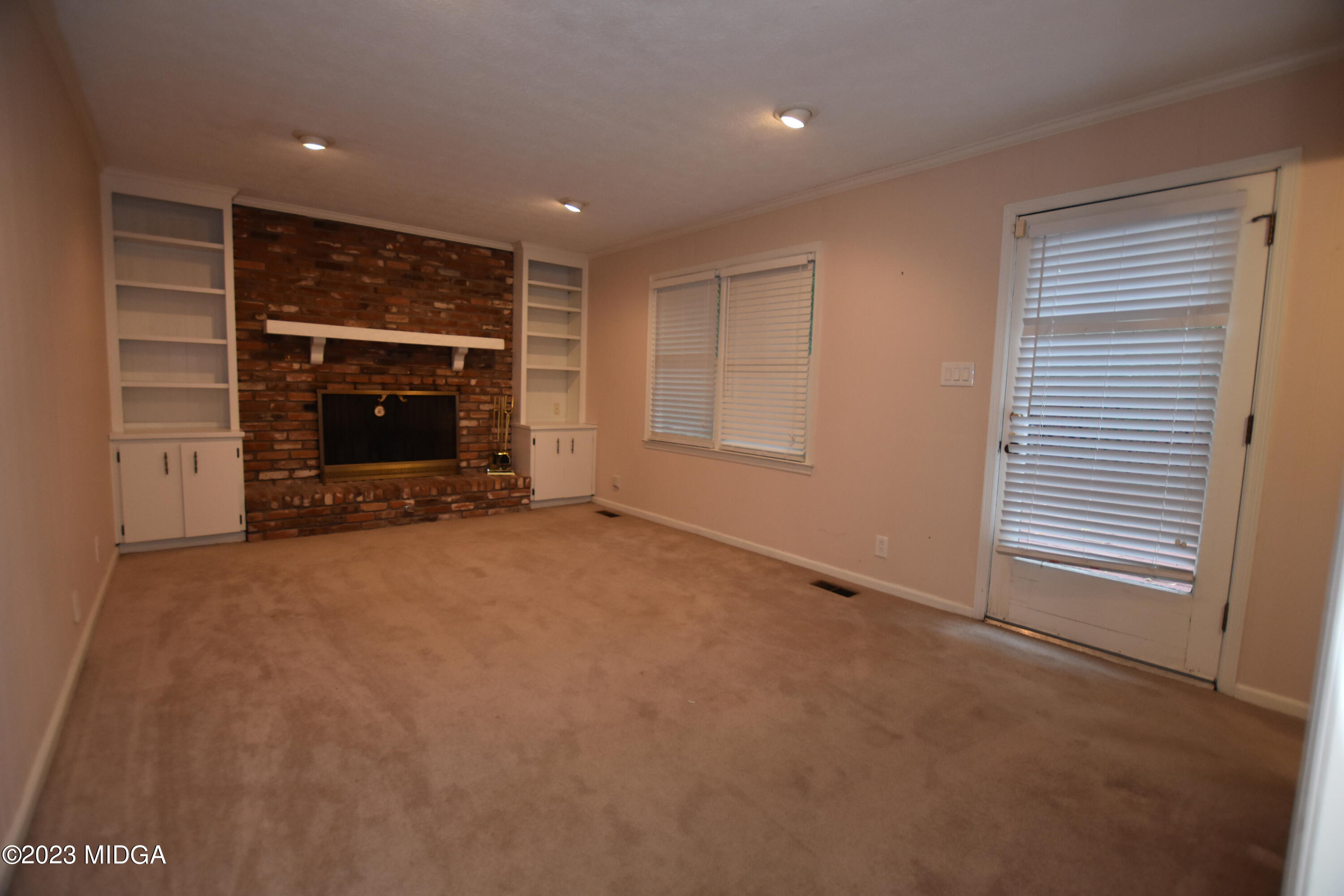 2994 Rolling Road Macon, GA 31204 - Photo 13 of 27 a view of an empty room with a window