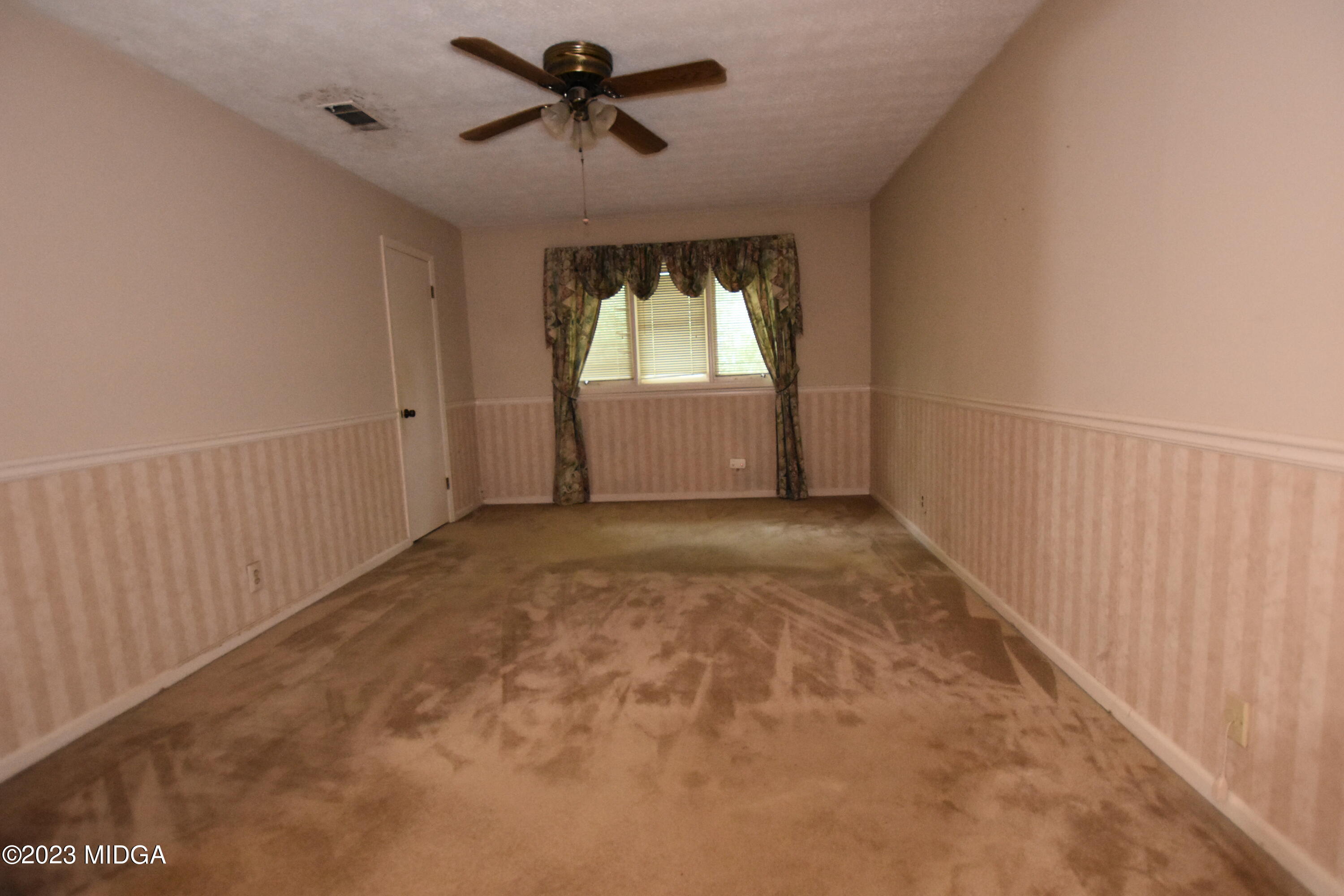 2994 Rolling Road Macon, GA 31204 - Photo 15 of 27 a view of room with a ceiling fan and window