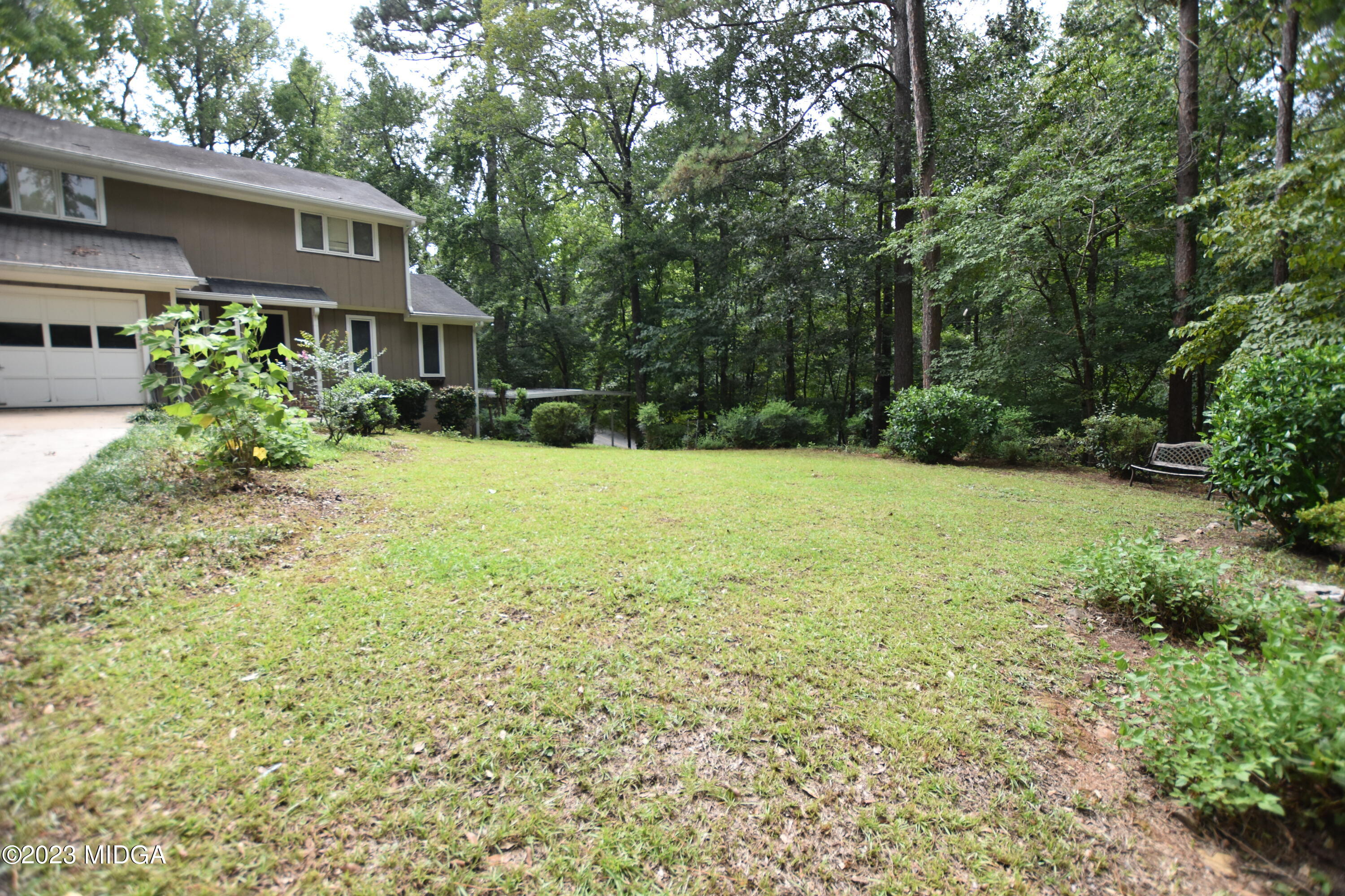 2994 Rolling Road Macon, GA 31204 - Photo 4 of 27 a view of a house with a yard